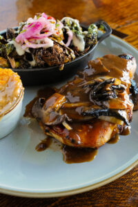 Towel City Tavern Smothered Pork Chop